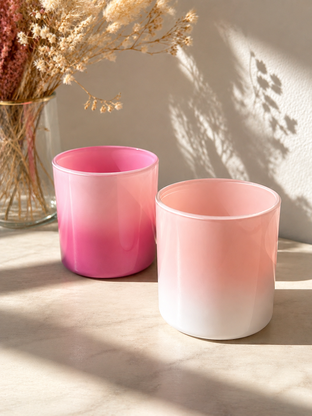 Velas em degradê rosa e blush